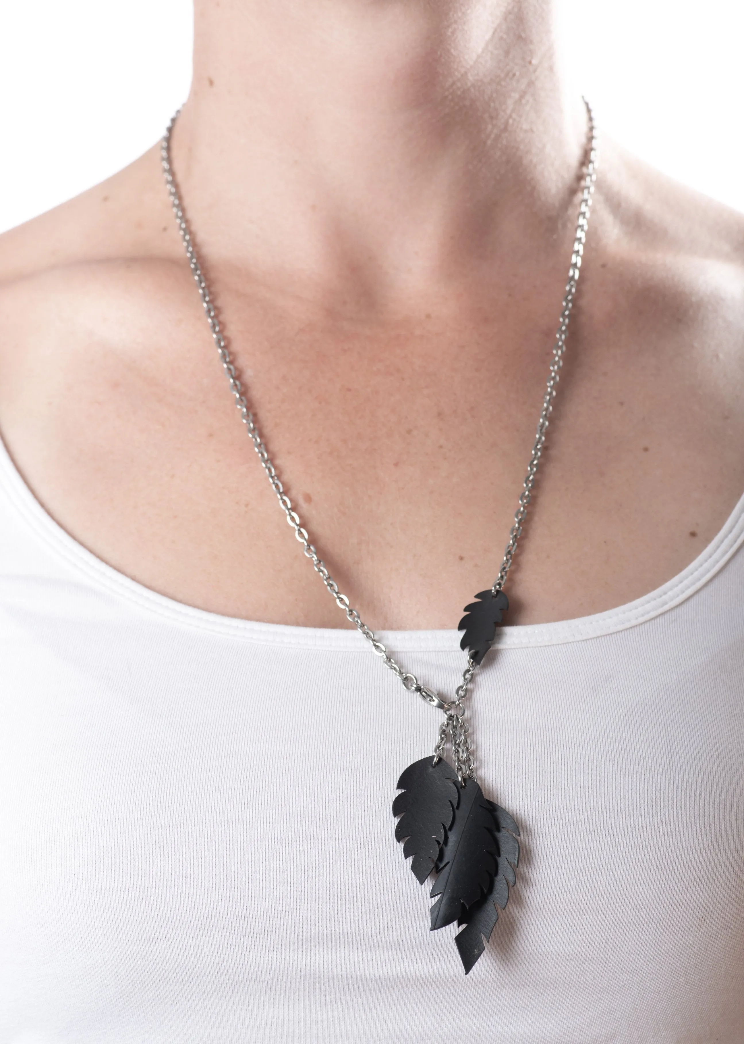 a-symmetrical feather necklace