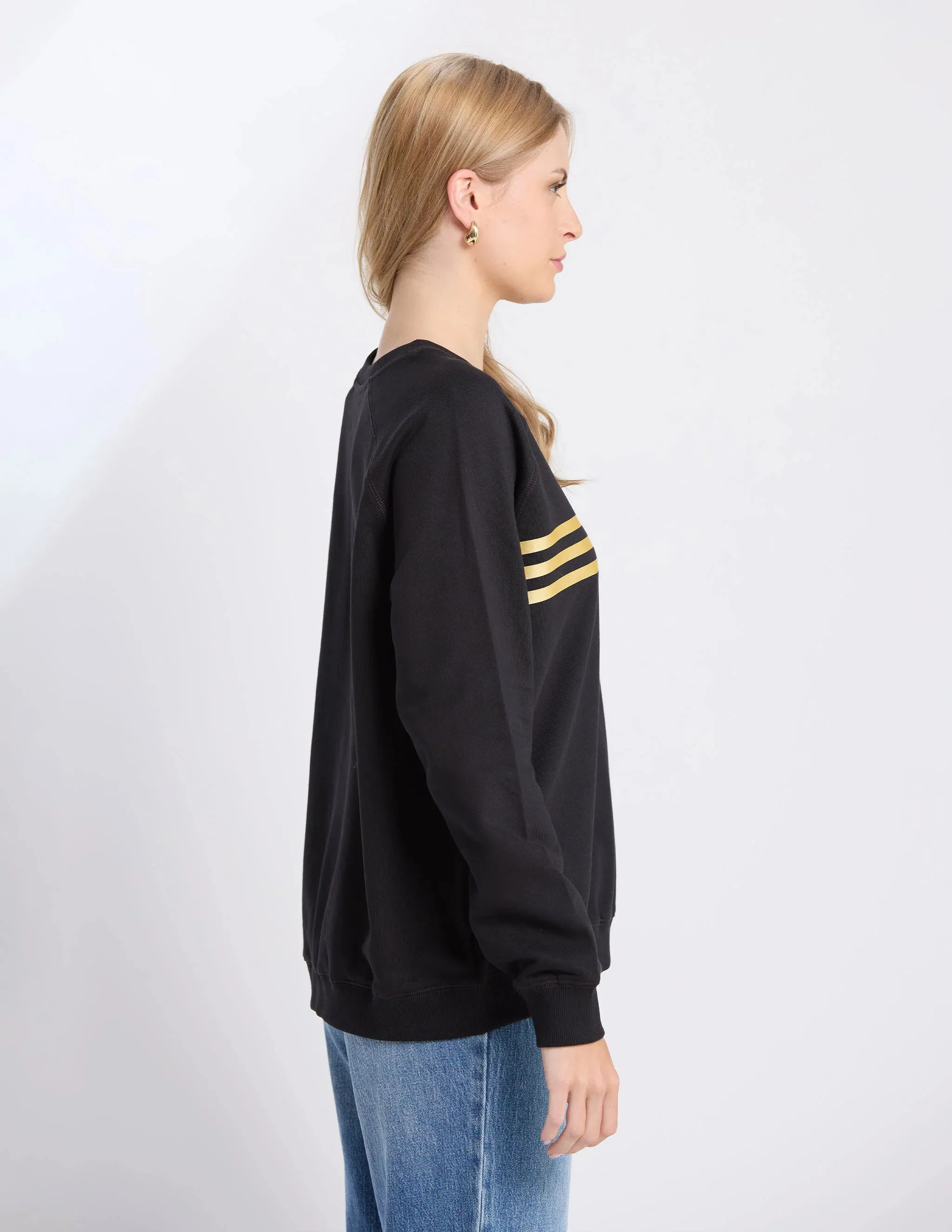 BLACK STAR CROSSED SWEATER