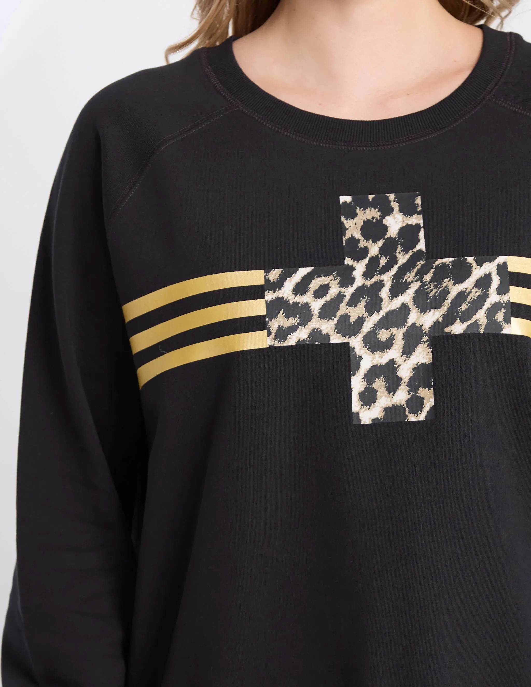 BLACK STAR CROSSED SWEATER