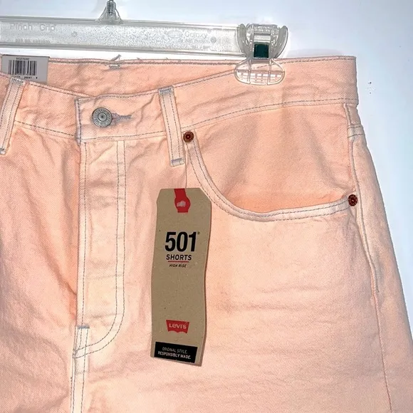 LEVI’S 501 signature button fly high rise cutoff light pink denim shorts