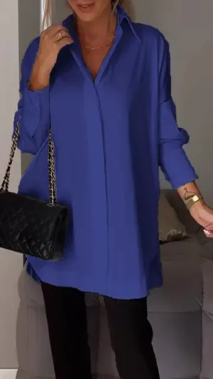 Stylish oversized blouse with rolled-up sleeves