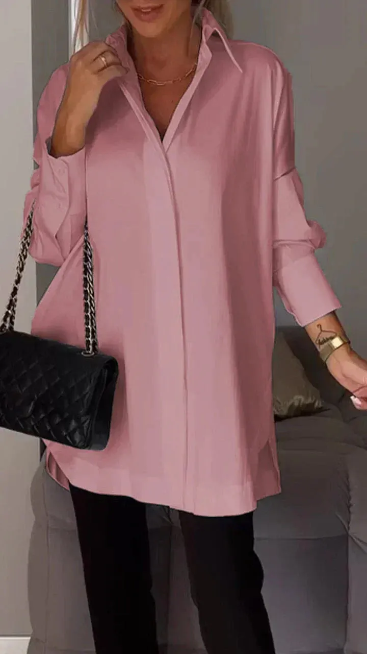 Stylish oversized blouse with rolled-up sleeves