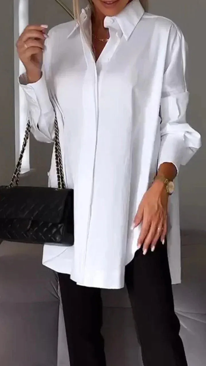 Stylish oversized blouse with rolled-up sleeves