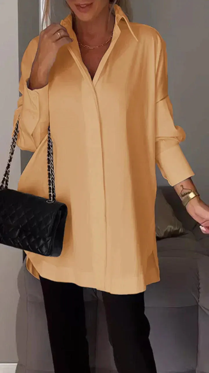 Stylish oversized blouse with rolled-up sleeves
