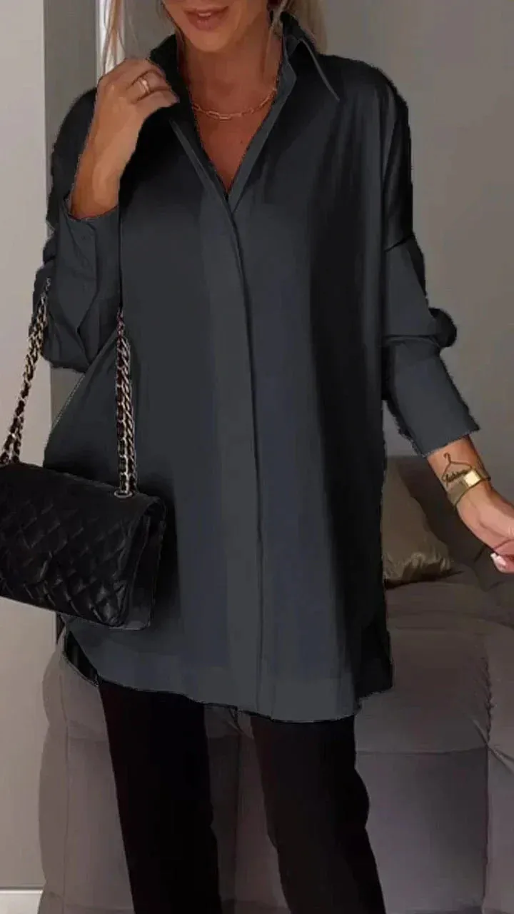 Stylish oversized blouse with rolled-up sleeves